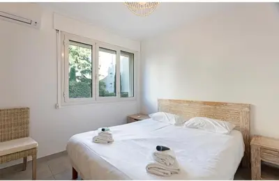 Un ou plusieurs lits dans un hébergement de l'établissement Appart 2 pièces Cannes Croisette-Martinez