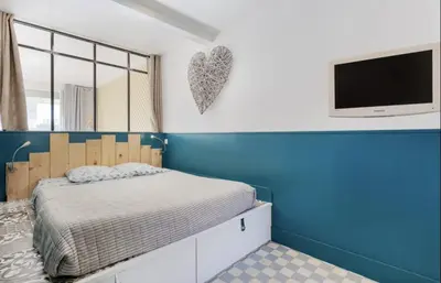 Un ou plusieurs lits dans un hébergement de l'établissement Croisette Beach Cannes Banane 4 sleeps Apart