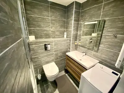 Salle de bains dans l'établissement Le Marignan SCLS - Wifi, Climatisation