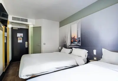 Un ou plusieurs lits dans un hébergement de l'établissement B&B HOTEL Antibes Sophia Le Relais