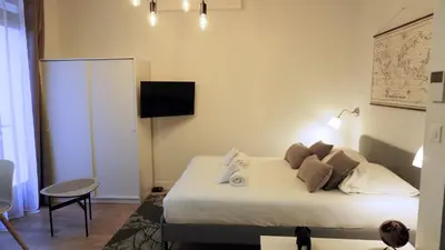 Télévision ou salle de divertissement dans l'établissement Proche Carlton & Croisette, Appartement 103