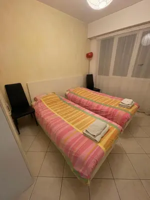 Un ou plusieurs lits dans un hébergement de l'établissement Appartement vue mer très proche de la plage et des commerces