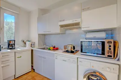 Cuisine ou kitchenette dans l'établissement Cap et Soleil - Happy Rentals