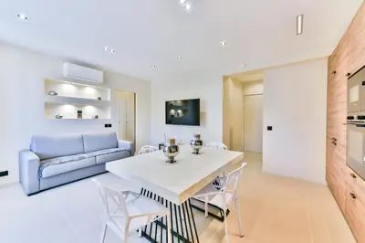 Coin salon dans l'établissement Cosy flat with parking - Basse Californie - Cannes