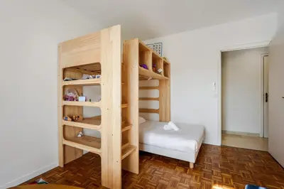 Un ou plusieurs lits dans un hébergement de l'établissement Appartement Mésangia - Welkeys