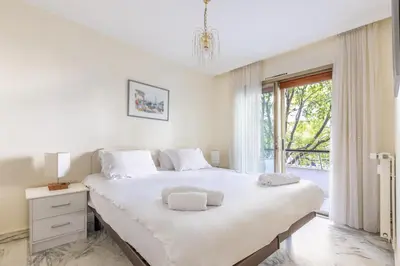 Un ou plusieurs lits dans un hébergement de l'établissement LB Vacation Rentals I Cannes Croisette, Large Terrace, Free Parking, Beaches