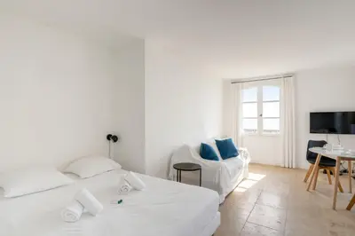 Un ou plusieurs lits dans un hébergement de l'établissement Appartement Portolan - Welkeys