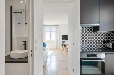 Cuisine ou kitchenette dans l'établissement Appartement Portolan - Welkeys