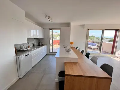 Cuisine ou kitchenette dans l'établissement Rooftop Villeneuve