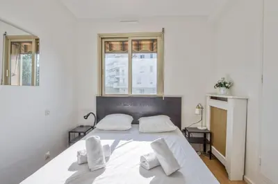 Un ou plusieurs lits dans un hébergement de l'établissement Appartement Berthelotine - Welkeys