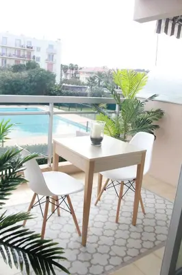 Piscine de l'établissement LES PALMIERS - Appartement avec piscine proche plages - Wifi et Clim ou située à proximité