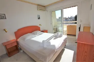 Un ou plusieurs lits dans un hébergement de l'établissement Appartement 80 m2 au centre-ville de Cannes
