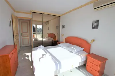 Un ou plusieurs lits dans un hébergement de l'établissement Appartement 80 m2 au centre-ville de Cannes