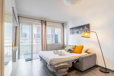 Un ou plusieurs lits dans un hébergement de l'établissement Beautiful apartment with balcony - Center Cannes