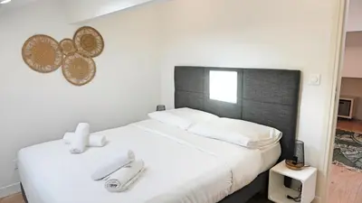 Un ou plusieurs lits dans un hébergement de l'établissement Proche Carlton & Croisette, Appartement 401 - Palmazur Vacances