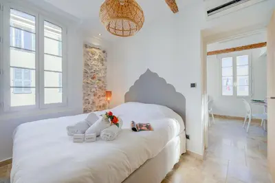 Un ou plusieurs lits dans un hébergement de l'établissement Appartement Angé 100m de la mer - Happy Rentals
