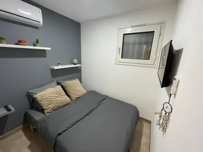 Télévision ou salle de divertissement dans l'établissement 2 Pièces Climatisé-WIFI / 4 voyageurs / Boxe Privé / 2 piscines / 2 tennis / Pétanque / PingPong