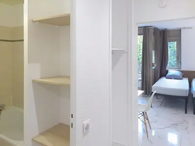 Un ou plusieurs lits dans un hébergement de l'établissement Résidence Graziella Studio 102