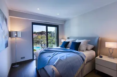 Un ou plusieurs lits dans un hébergement de l'établissement Parc du Cap Luxury Apartment