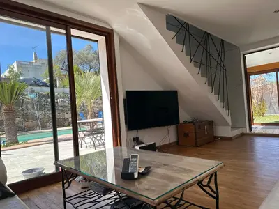 Télévision ou salle de divertissement dans l'établissement Villa Natval