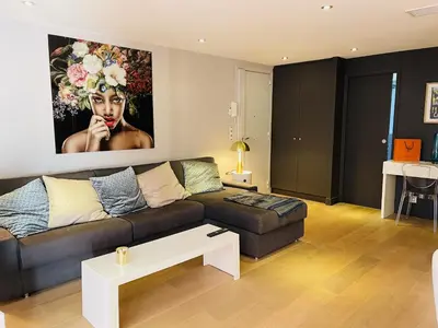 Coin salon dans l'établissement Magnifique Modern appartement avec terrasse FERN12