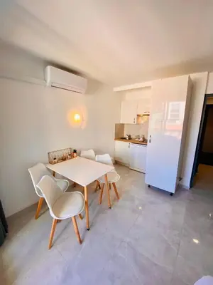 Cuisine ou kitchenette dans l'établissement Résidence Graziella Studio 424