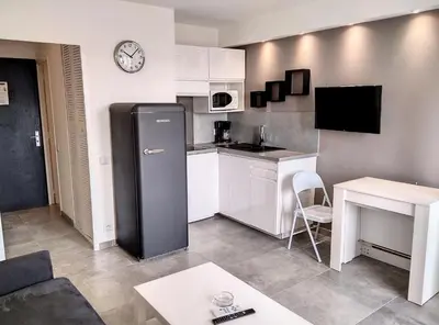 Cuisine ou kitchenette dans l'établissement Résidence Graziella Studio 426