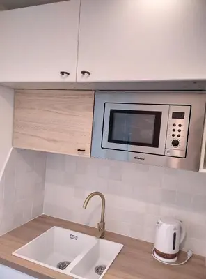 Cuisine ou kitchenette dans l'établissement Résidence Graziella Appartement 222
