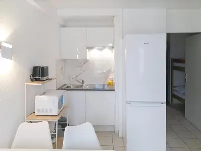 Cuisine ou kitchenette dans l'établissement Résidence Graziella Studio 502