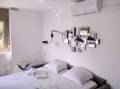 Un ou plusieurs lits dans un hébergement de l'établissement Résidence Graziella Appartement 521