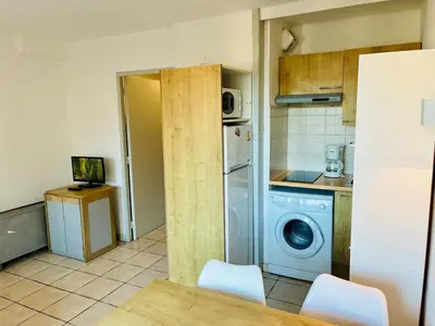 Cuisine ou kitchenette dans l'établissement Résidence Graziella Studio 326