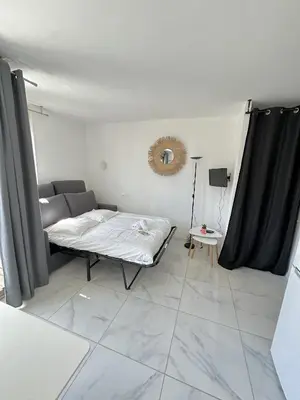 Un ou plusieurs lits dans un hébergement de l'établissement Résidence Graziella Studio 403