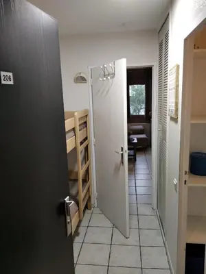Un ou plusieurs lits dans un hébergement de l'établissement Résidence Graziella Studio 206