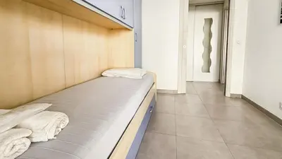 Un ou plusieurs lits dans un hébergement de l'établissement Modern 2 Bd Next To Rue Dantibes
