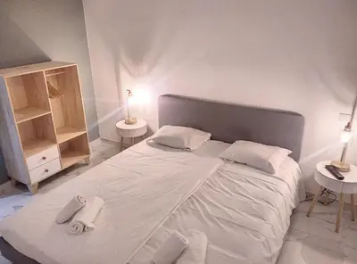 Un ou plusieurs lits dans un hébergement de l'établissement Residence le Courbet