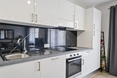 Cuisine ou kitchenette dans l'établissement Appartement Sauvalie - Welkeys