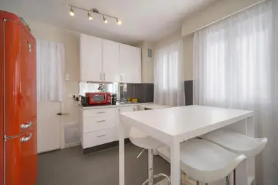 Cuisine ou kitchenette dans l'établissement FRGK - Surcouf 'Palm Beach ' AC WIFI HIGH SPEED