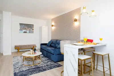 Coin salon dans l'établissement Perle Dorée YourHostHelper