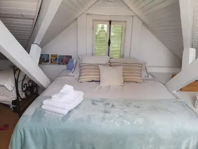 Un ou plusieurs lits dans un hébergement de l'établissement Villa Acacia