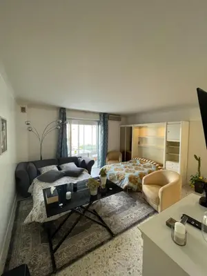 Coin salon dans l'établissement Cool Appart sur Croisette Palm Beach