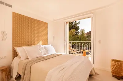 Un ou plusieurs lits dans un hébergement de l'établissement Maison Carla Rosa Cannes