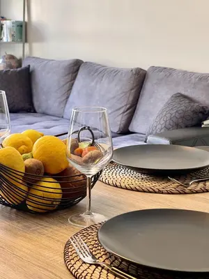 Coin salon dans l'établissement Très bel appartement dans résidence avec piscine à 5min des plages de Villeneuve Loubet.