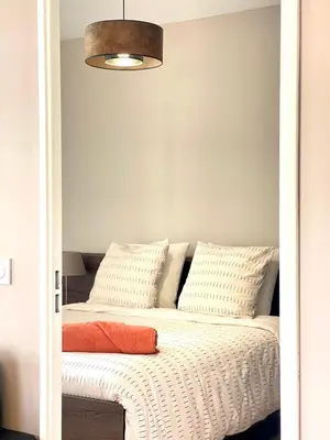 Un ou plusieurs lits dans un hébergement de l'établissement Très bel appartement dans résidence avec piscine à 5min des plages de Villeneuve Loubet.