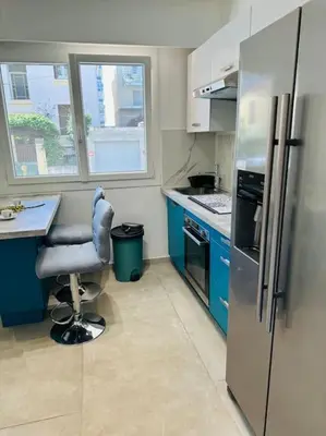 Cuisine ou kitchenette dans l'établissement Cosy Studio à deux pas de la plage, de la gare et du palais des congrès