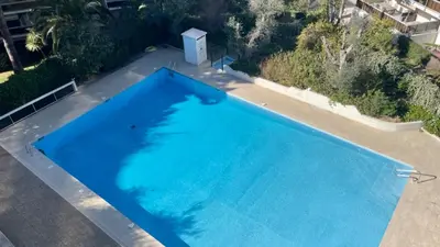 Piscine de l'établissement Ideal vacation apartment in Juan-les-Pins, with a pool and 5 minutes from the beach ou située à proximité