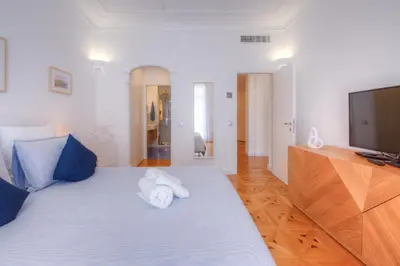 Un ou plusieurs lits dans un hébergement de l'établissement Palais Miramar