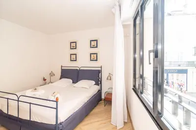 Un ou plusieurs lits dans un hébergement de l'établissement Cannes Rue d'Antibes Premium 2 BDR 2 baths Exclusive Olam Properties