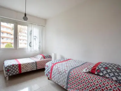 Un ou plusieurs lits dans un hébergement de l'établissement Apartment Epsom by Interhome