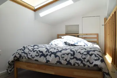 Un ou plusieurs lits dans un hébergement de l'établissement Grand studio-Mezzanine-Centre Cannes
