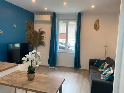 Coin salon dans l'établissement Appartement Etat neuf La Chantalane -proche centre-ville